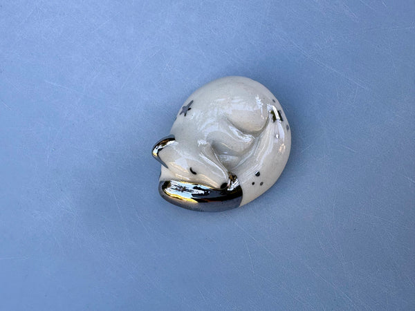 Tiny Guardian: Arctic Fox Figurine Ceramic Sculpture with Silver (22kt white gold)