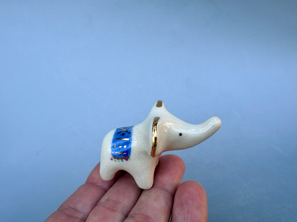 Tiny Guardian: Baby Elephant Figurine with BLUE blanket, Ceramic Sculpture