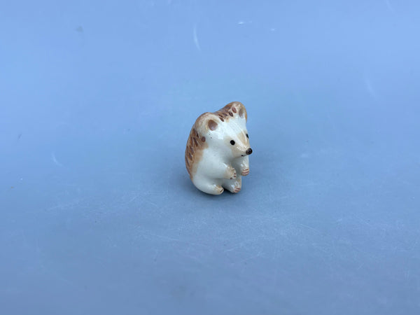 Tiny Guardian: Hedgehog Figurine Ceramic Sculpture