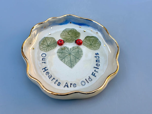 Our Hearts Are Old Friends, Ladybug with Heart Shaped Leaves, Ceramic Dish with Gold Accents - Vuvu Ceramics