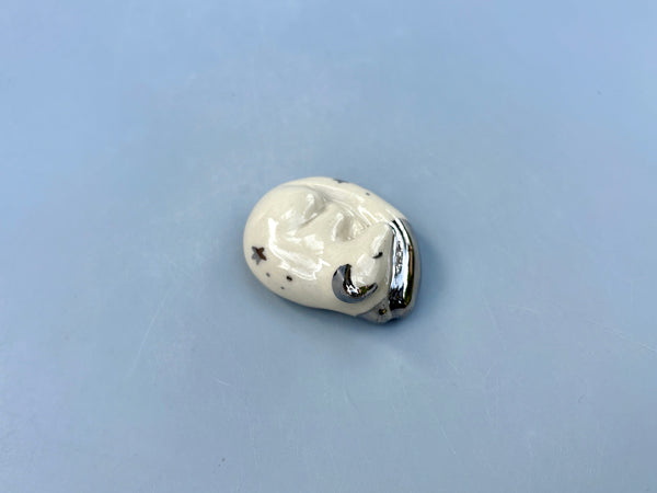 Tiny Guardian: Arctic Fox Figurine Ceramic Sculpture with Silver (22kt white gold) - Vuvu Ceramics