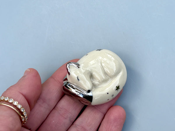 Tiny Guardian: Arctic Fox Figurine Ceramic Sculpture with Silver (22kt white gold) - Vuvu Ceramics